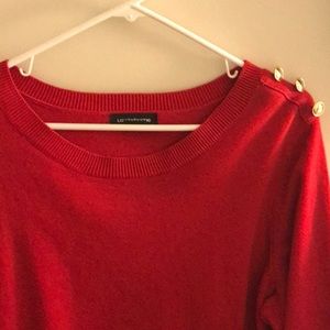Very nice red sweater with gold decorative buttons on the shoulders. Size 1X
